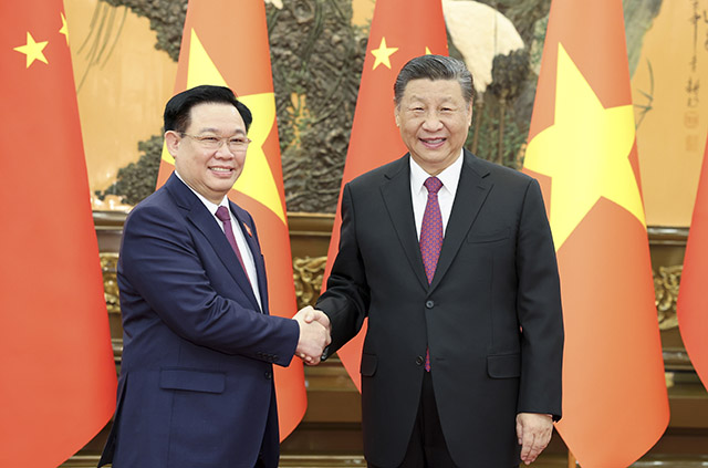 習近平會見越南國會主席王庭惠